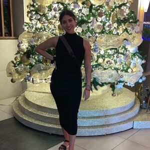 Sleeveless black knitted midi dress from express; size small!